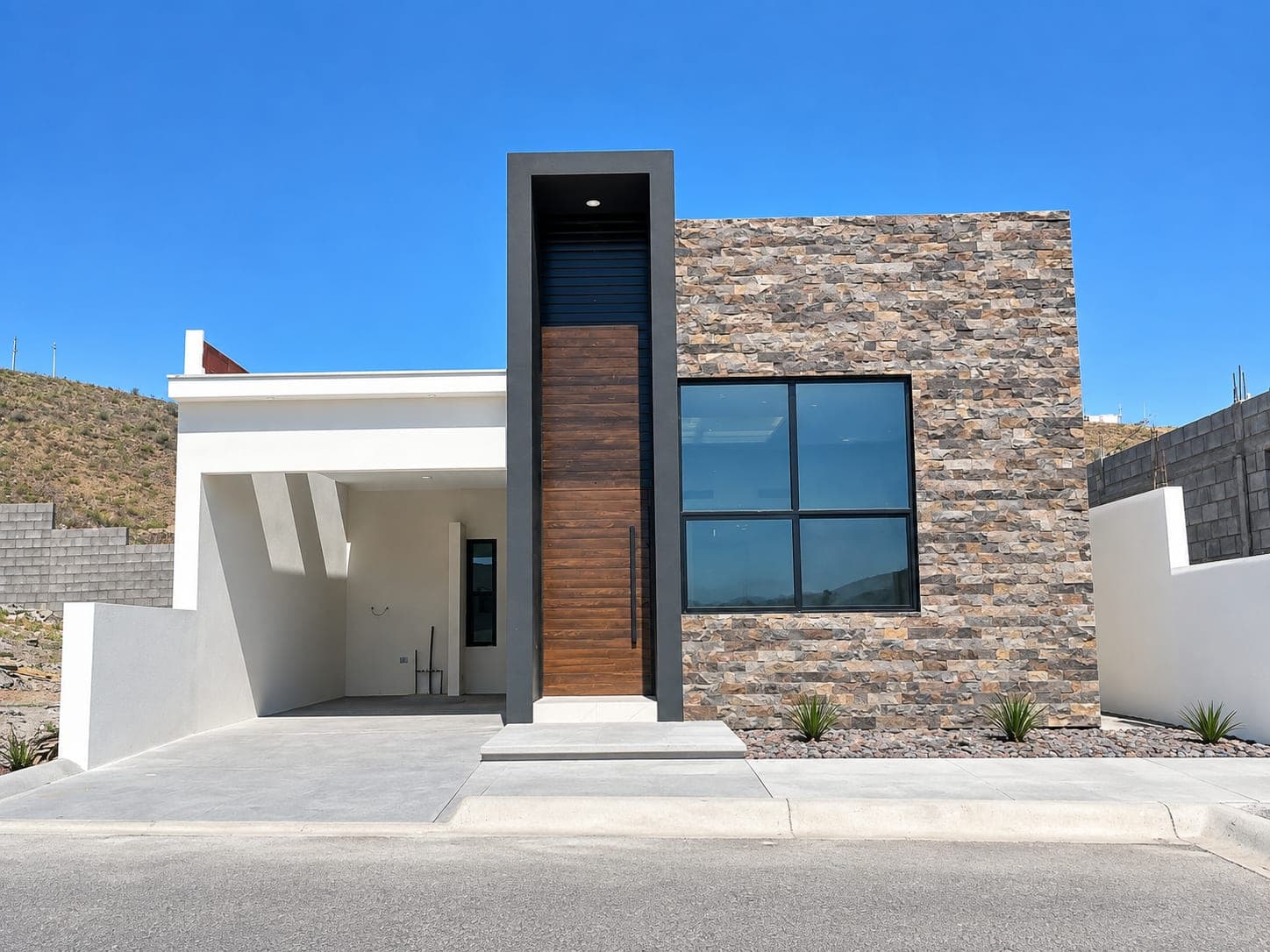 Fachada de Casa Aurora, casa de una planta construida por Casas Abrek en Monte Caleres.